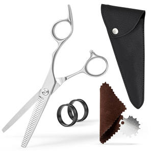 Ciseaux de coiffure en acier inoxydable de qualité supérieure, tendance et durables, pour une coupe fluide avec repose-doigts confortable - Product Image 1