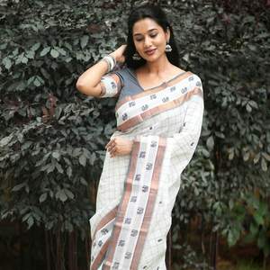 ATRACTIVA BANARASI SEDA CON COBRE ZARI TEJIDO FRONTERA CON ESTAMPADO TRABAJO SAREE CON BLUSA DESCOSADA BLANCO - Product Image 1