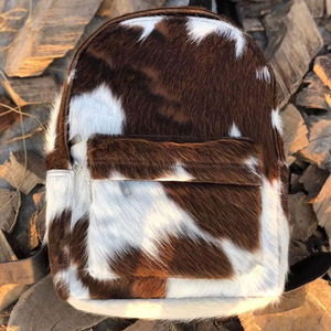 Luxury handmade cowhide leather hair on school <b>backpacks</b> wholesale supplier OEM custom export student bags in affordable price - Product Image 2