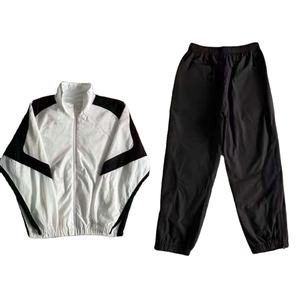 Conjunto de Chaqueta y Pantalón con Cierre de 2 Piezas, Diseño Más Reciente, 100% Nailon, Impermeable, Cortavientos, Traje Deportivo para Hombre - Product Image 1