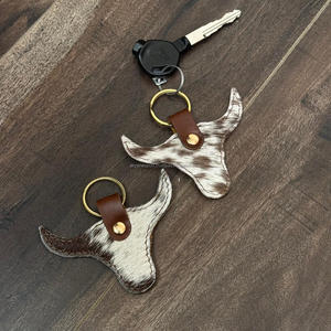 Nouveau personnalisé mignon tête de vache conception porte-clés en cuir de vachette rond porte-clés Style Cowboy charme en gros porte-clés pour unisexe - Product Image 4