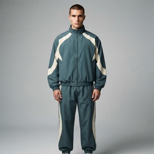 Veste coupe-vent et pantalon de survêtement ample personnalisés avec logo brodé 3D de haute qualité, ensemble de survêtement 100% nylon pour hommes - Product Image 1