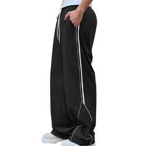 Pantalon de jogging décontracté pour homme, coupe large, taille élastique avec cordon de serrage, bande latérale, léger en polyester, idéal pour l'été - Product Image 1