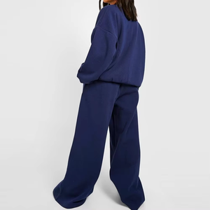 เสื้อฮู้ดครอปแบบลำลองผ้าทึบลายโลโก้ขาดๆ ชุดเซ็ต 2 ชิ้น กางเกงวอร์มทรงหลวม ระบายอากาศได้ดี เป็นมิตรกับสิ่งแวดล้อม สำหรับผู้หญิง - Product Image 1