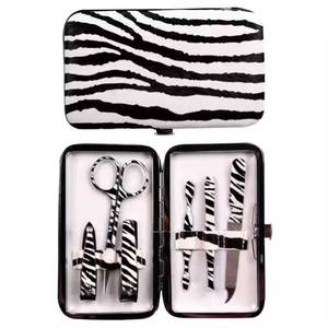 Kit de manucure classique vert imprimé zèbre avec coupe-ongles, ciseaux, lime et étui portable à ressort unique 10-en-1 pour usage adulte - Product Image 6