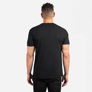 T-shirts décontractés en coton uni pour femmes, à manches courtes et col rond, avec ourlet incurvé Next Level Drop Cut - Product Image 4