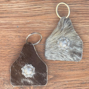 Vente chaude À La Main En Cuir Coloré En Forme D'étoile Porte-clés Western En Cuir Véritable Cowboy Cowgirl Porte-clés Vache Imprimer Porte-clés - Product Image 2
