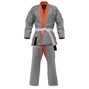 Uniforme de BJJ Gris con Ribete Naranja, Ajustado, Unisex para Adultos, Ropa de Artes Marciales, 100% Algodón, Impresión de Logotipo Personalizado, En Stock - Product Image 1