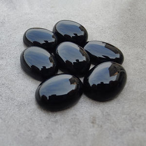 Piedra Preciosa Calibrada de Ónix Negro Natural AAA+ en Forma Ovalada con Reverso Plano, Pulida y Lisa, Disponible al por Mayor - Product Image 1