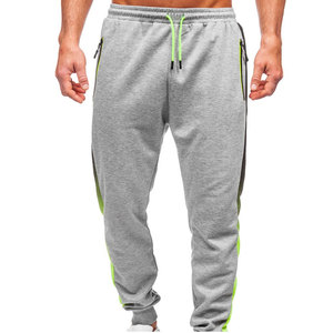 Pantalon de survêtement gris pour homme avec bandes latérales vert fluo, taille élastique et cordon de serrage, joggers décontractés respirants en mélange polyester-coton - Product Image 1