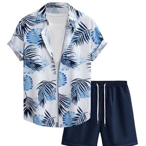 Conjunto de dos piezas con estampado de hojas azules tropicales para hombre, camisa de manga corta con botones y pantalones cortos con cintura elástica, conjunto ligero de playa para verano - Product Image 1