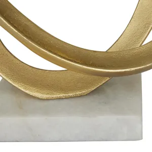 Figurine en métal plaqué or faite à la main, élément décoratif moderne et élégant pour la maison et cadeau d'affaires pour les espaces contemporains dans le monde entier - Product Image 5