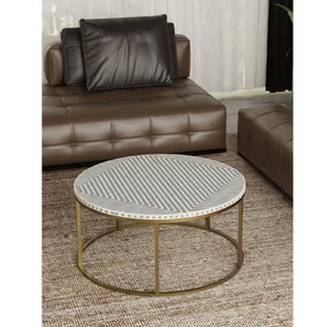 Mesa de centro redonda con incrustaciones de hueso negro que exhibe delicados motivos de hojas de vid blancas sobre una base de madera oscura con patas cruzadas. A precio de mayorista. - Product Image 2