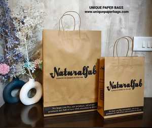 ถุงกระดาษคราฟท์สีน้ำตาลหรูหรา สำหรับช้อปปิ้ง  รับทำแบรนด์ตามสั่ง  รีไซเคิลได้  ถุงบรรจุภัณฑ์สำหรับร้านค้าปลีก  ผู้ผลิต - Product Image 1