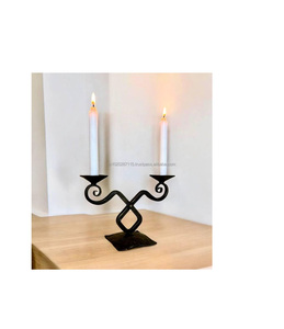 Elegant <b>black</b> iron <b>candelabra</b> handcrafted with scroll arms for use in historic homes wedding setups or garden parties - Product Image 5