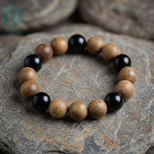 สร้อยข้อมือไม้กฤษณาธรรมชาติที่ต้องมี รุ่น AL-SB-0014-12 สำหรับสวมใส่ทุกวัน ประดับด้วยลูกปัดปะการัง 5 เม็ด และลูกปัดไม้กฤษณา 12 เม็ด กลิ่นหอมเฉพาะตัว - Product Image 1
