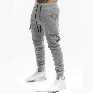 Pantalon de survêtement décontracté pour homme Gym Fitness Workout Sportswear Pantalon de survêtement en coton avec poches multiples pour la course à pied, le jogging et le sport - Product Image 1