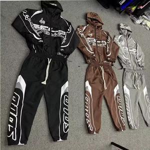 Conjunto deportivo personalizado de gran tamaño, pantalones deportivos holgados de nailon, conjunto de dos piezas para correr, chándal cortavientos de nailon para hombre - Product Image 1