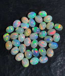 ethopian <b>opal</b> oval shape,natural ethopian <b>opal</b> cabochons.multi fire <b>opal</b> for sell. - Product Image 1