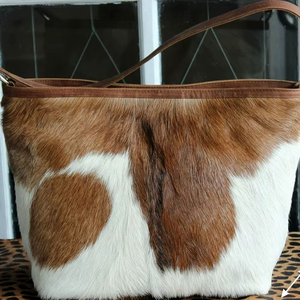 กระเป๋าโท้ทหนังแท้แบรนด์หรูสำหรับผู้หญิง คุณสมบัติป้องกันการโจรกรรม เหมาะสำหรับใช้ในช่วงฤดูร้อนและชายหาด พร้อมกระเป๋าใบเล็กเย็บลายวี ผลิตจากโรงงานโดยตรง - Product Image 3