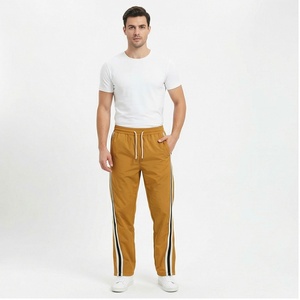 Pantalon de survêtement en nylon à jambe large et ouverture zippée sur le côté personnalisé Patchwork ceinture élastique pantalon empilé pour hommes pantalon d'hiver de survêtement pour hommes - Product Image 1