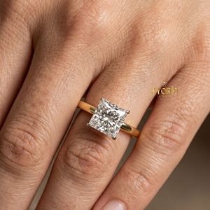 แหวนหมั้นทรงเจ้าหญิงแบบโซลิแทร์ ทอง 14K ดีไซน์คลาสสิกแบบสี่ขา - Product Image 5