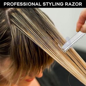 Peigne à cheveux en acier inoxydable avec dents texturisantes et corps en plastique durable pour usage professionnel en salon - Product Image 6