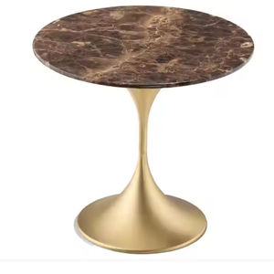 Table basse ronde tendance au design contemporain avec base en métal doré et plateau en marbre, idéale pour la décoration du salon. - Product Image 1