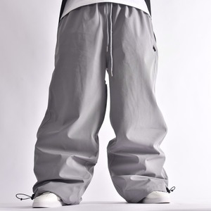 High Quality Men's Baggy Ski Pants Custom Streetwear with Windproof Feature Waterproof Wide Leg Design Snowboard Cargo Pockets - Product Image 1