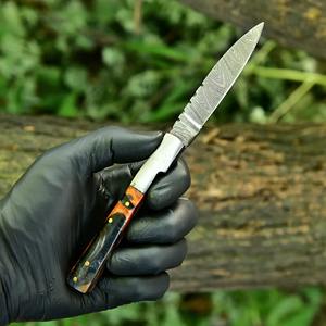 มีดพับสำหรับใช้งานกลางแจ้ง ใบมีดคมตรง พร้อมระบบล็อคกรอบที่ปลอดภัย เหมาะสำหรับการล่าสัตว์และการเตรียมอาหาร - Product Image 1