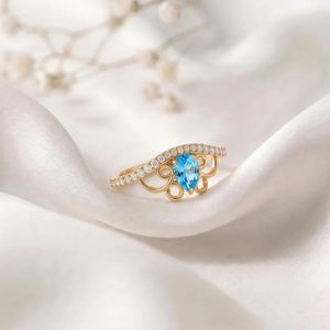 แหวนแต่งงานโทแพซสีฟ้าธรรมชาติทรงลูกแพร์ ทำมือ เงินแท้ 925 ชุบทอง 18K เครื่องประดับงานแต่งงาน ของขวัญเครื่องประดับชั้นดี - Product Image 4