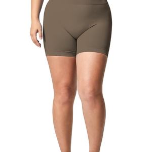 Venta al por mayor de pantalones cortos de motorista sin costuras de color sólido para correr las mujeres de yoga pantalones cortos de gimnasio de control de barriga mujeres pantalones cortos de yoga amarillo - Product Image 1