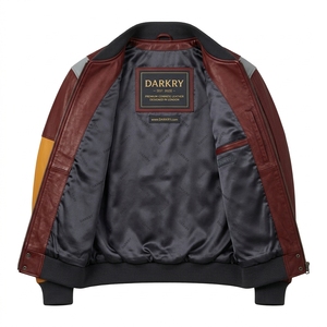 Blouson universitaire homme en cuir véritable colorblock, rouge bordeaux et jaune moutarde, avec fermeture à boutons-pression et poignets côtelés, style streetwear - Product Image 5