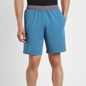 Shorts Bermuda pour homme, couleur unie, avec taille élastique et poches, style décontracté, en coton tricoté respirant, taille mi-haute - Product Image 1