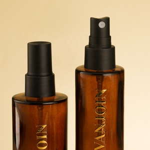 Bottiglia in Vetro Ambrato Cilindrica Portatile da 40ml 60ml 100ml con Pompa Spray Nera Opaca e Coperchio per Profumi e Fragranze per la Casa - Product Image 5