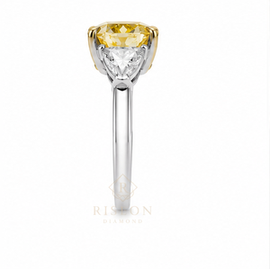 Luxurious three stone ring in 18K white gold with fancy yellow cushion diamond trillion side diamonds sleek minimal couture desi - Product Image 4