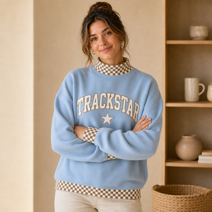 เสื้อสเวตเชิ้ตคอเต่าผู้หญิงลายตารางสีฟ้าอมน้ำตาล ยี่ห้อ Trackstar สีงาช้าง ปักตัวอักษรรูปดาว โลโก้สั่งทำ แบรนด์ส่วนตัว ขายส่ง - Product Image 1