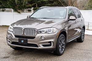BMW X5 xDrive35i del 2017 Usata in Ottime Condizioni, Motore Turbo a 6 Cilindri, Colore Atlas Cedar Metallic, Interni Mocha, Pacchetto Clima Freddo - Product Image 3