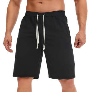 Shorts de sport pour hommes en molleton de coton noir avec taille élastiquée et cordon de serrage long, longueur genou, style short de plage, vêtements de sport, en vente - Product Image 1