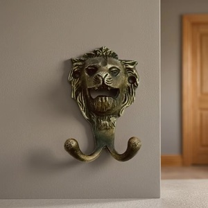 Crochet mural vintage en fonte avec visage de lion, double crochet, support métallique robuste pour vêtements et chapeaux - Product Image 1