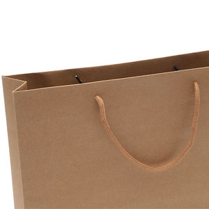 Bolsas de compras de papel kraft personalizadas con asas, ecológicas y duraderas, ideales para comercio minorista y embalaje. - Product Image 5