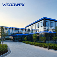 VICDOWEX Maison préfabriquée de luxe intégrée en forme de T avec fenêtres en aluminium pour usage commercial et bureautique contemporain