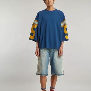 เสื้อเจอร์ซีย์อเมริกันฟุตบอลทรงโอเวอร์ไซส์ ยูนิเซ็กซ์ พิมพ์ลาย สไตล์ฮิปฮอป ผ้าฝ้าย 100% คอทรงโอ รับสกรีนโลโก้ สวมใส่สบาย ระบายอากาศได้ดี สไตล์วินเทจ - Product Image 2