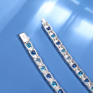 สร้อยข้อมือเทนนิสเพชรทรงปรินเซสคัทสีน้ำเงินและสีขาว ทอง 14K 18K หรูหรา สำหรับทุกเพศ พร้อมใบรับรอง IGI - Product Image 3