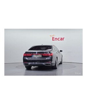 BMW Série 7 730d XDrive Mai 2020 76 783 km Diesel Boîte Automatique Sièges en Cuir Conduite à Gauche Design Pure Excellence Arrière - Product Image 4