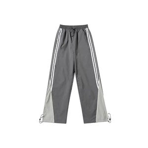 กางเกงวินด์เบรกเกอร์ผู้ชายลายโลโก้แบบกำหนดเอง กางเกงวอร์มทรงบานสไตล์วินเทจพร้อมแถบโค้งตรง กางเกงแทร็คไนลอน 2026 - Product Image 3