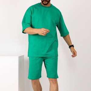 T-shirt décontracté à manches courtes et col rond pour homme, coupe oversize, vert uni, tricoté, design épuré - Product Image 1