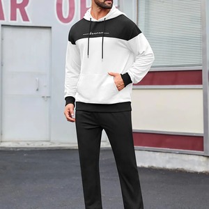 Ensemble de survêtement classique uni, conçu pour le confort et la durabilité, en tissu de coton doux et respirant, coupe décontractée. - Product Image 5