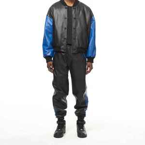 Chándal de hombre negro y azul con bloques de color, estilo urbano, de poliéster impermeable, corte regular, para invierno - Product Image 1