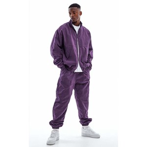 Conjunto Deportivo Morado para Hombre, Chaqueta con Cierre Completo y Cuello Alto, Pantalones Deportivos Ligeros de Nailon, Color Sólido, Bolsillos Laterales, Corte Holgado, Ropa de Primavera - Product Image 1